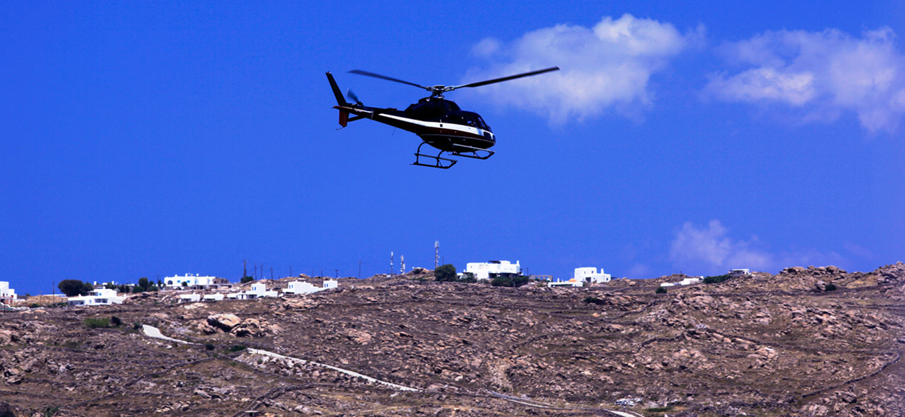 the king of villas mykonos concierge services helicopter tours